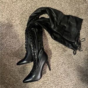 Thigh high boots lace up